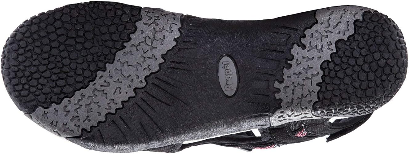 Close-up of a black and gray shoe sole with textured grip.